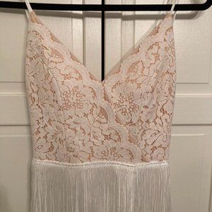 Beautiful white lace and tasseled gown by Giffniseti. Size S.